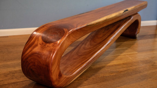 Single piece bench seat free-flowing sculpture